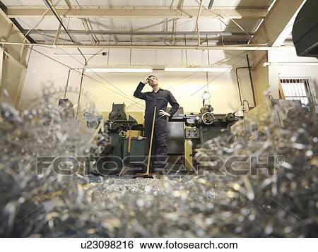 Engineer Resting From Sweeping Swarf View Large Photo Image Stock Photograph - Engineer Resting From Sweeping Swarf. Fotosearch