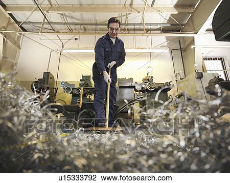 Engineer Sweeping Swarf View Large Photo Image Stock Image - Engineer Sweeping Swarf. Fotosearch