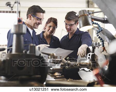 Engineer Teaching Apprentices View Large Photo Image Stock Image - Engineer Teaching Apprentices. Fotosearch