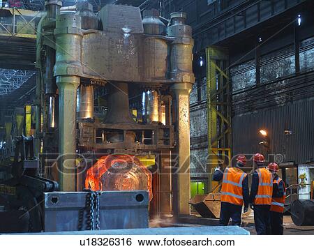 Engineers & Hot Steel In Forging Machine View Large Photo Image Stock Photograph - Engineers & Hot Steel In Forging Machine. Fotosearch
