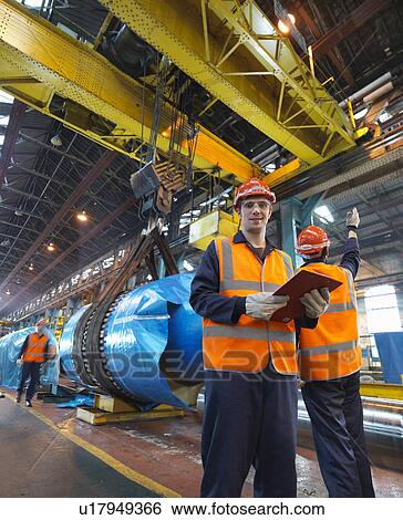 Stock Photograph - Engineers Packing Finished Steel. Fotosearch