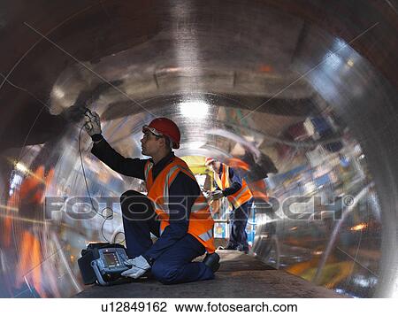 Engineers Testing Forged Steel View Large Photo Image Stock Image - Engineers Testing Forged Steel. Fotosearch