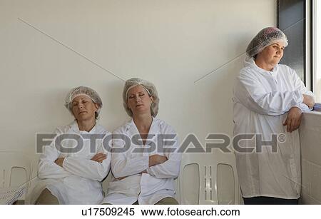 Stock Photography - Factory workers resting. Fotosearch