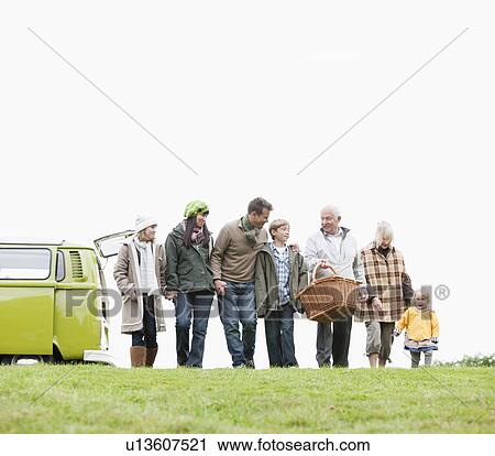 Family heading out for a picnic View Large Photo Image Stock Image - Family heading out for a picnic. Fotosearch