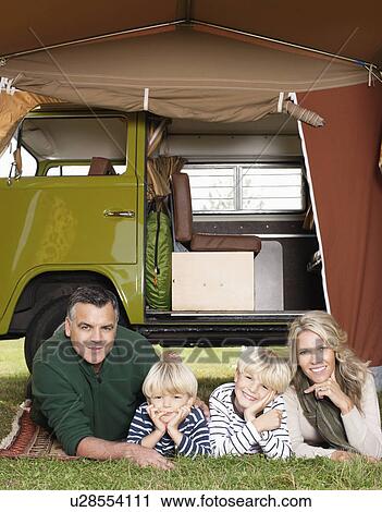 Family in front of camper van View Large Photo Image Stock Image - Family in front of camper van. Fotosearch