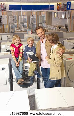 Family is happy about their new purchase View Large Photo Image Stock Photography - Family is happy about their new purchase. Fotosearch