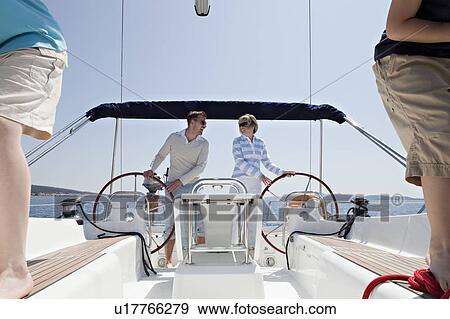 Stock Photo - Family on yacht. Fotosearch