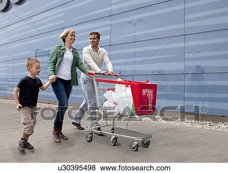 Stock Photo - Family shopping. Fotosearch