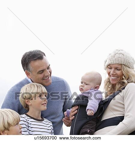 Stock Image - Family with baby outdoors. Fotosearch