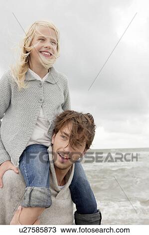 Father and daughter on beach View Large Photo Image Stock Image - Father and daughter on beach. Fotosearch