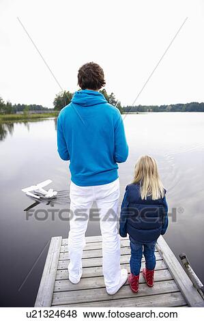 Stock Photo - Father and daughter with rc plane. Fotosearch