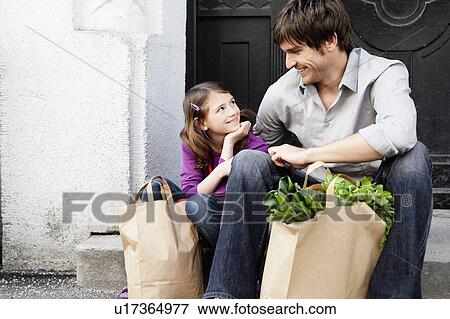 Father and girl shopping groceries View Large Photo Image Stock Photo - Father and girl shopping groceries. Fotosearch