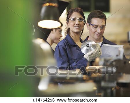 Female Apprentice In Workshop View Large Photo Image Stock Image - Female Apprentice In Workshop. Fotosearch