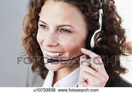 female call center agent talking View Large Photo Image Stock Photo - female call center agent talking. Fotosearch