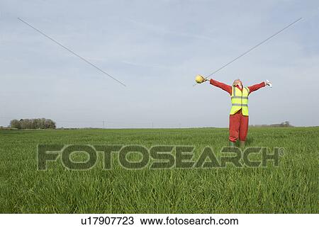 Female surveying countryside View Large Photo Image Stock Image - Female surveying countryside. Fotosearch