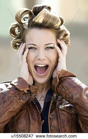 Female with her hair in curls, screaming View Large Photo Image Stock Photo - Female with her hair in curls, screaming. Fotosearch