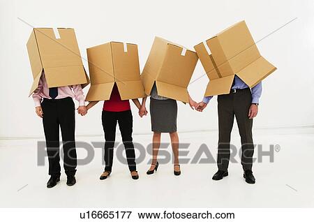 Four workers united in too much work View Large Photo Image Stock Photo - Four workers united in too much work. Fotosearch