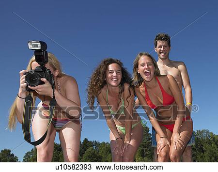 Friends taking pictures View Large Photo Image Stock Image - Friends taking pictures. Fotosearch