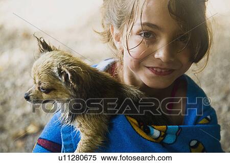 Stock Photography - Girl and little dog. Fotosearch