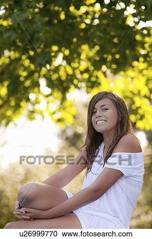 Girl in a garden View Large Photo Image Stock Image - Girl in a garden. Fotosearch