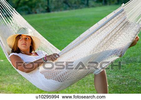 Girl in a hammock View Large Photo Image Picture - Girl in a hammock. Fotosearch