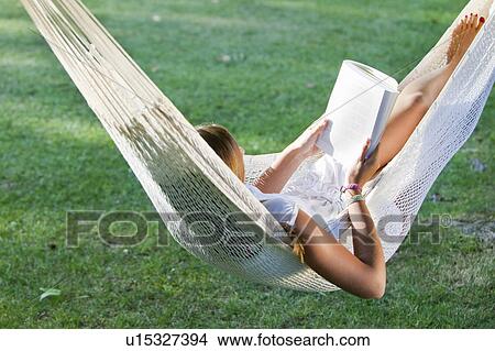 Girl in a hammock View Large Photo Image Picture - Girl in a hammock. Fotosearch