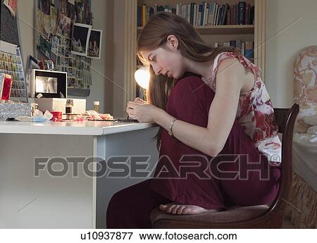 Girl making jewelry View Large Photo Image Stock Photo - Girl making jewelry. Fotosearch