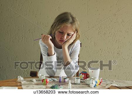 Girl painting china tea set View Large Photo Image Stock Image - Girl painting china tea set. Fotosearch