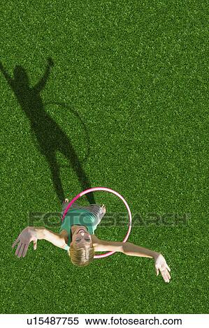 Girl playing in garden View Large Photo Image Stock Photography - Girl playing in garden. Fotosearch
