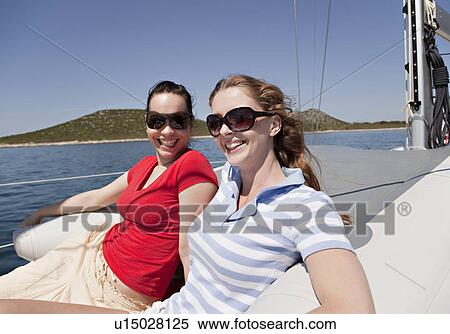 Girls on yacht View Large Photo Image Stock Photography - Girls on yacht. Fotosearch