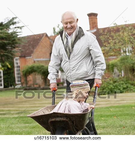 Stock Image - Grandfather and Granddaughter. Fotosearch