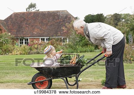 Stock Photo - Grandfather and Granddaughter. Fotosearch