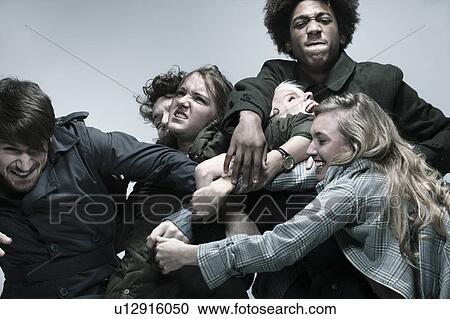 Group of adults fighting for space View Large Photo Image Stock Image - Group of adults fighting for space. Fotosearch