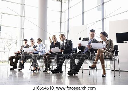 Group of business people with chairs View Large Photo Image Stock Image - Group of business people with chairs. Fotosearch