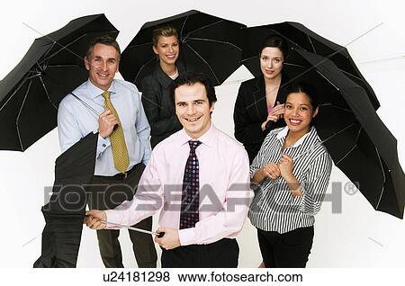 Group of business people with umbrellas View Large Photo Image Stock Photo - Group of business people with umbrellas. Fotosearch