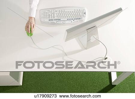 Hand on a green mouse View Large Photo Image Stock Image - Hand on a green mouse. Fotosearch
