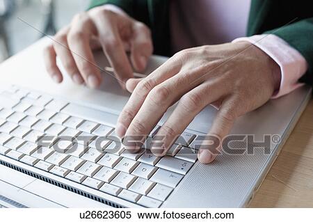 Hands typing on laptop View Large Photo Image Stock Photography - Hands typing on laptop. Fotosearch