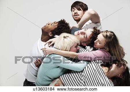 Interconnected group of young adults View Large Photo Image Picture - Interconnected group of young adults. Fotosearch