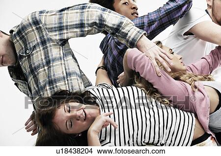 Picture - Interconnected group of young adults. Fotosearch