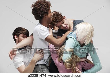 Interconnected group of young adults View Large Photo Image Picture - Interconnected group of young adults. Fotosearch