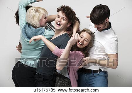 Interconnected group of young adults View Large Photo Image Stock Photography - Interconnected group of young adults. Fotosearch