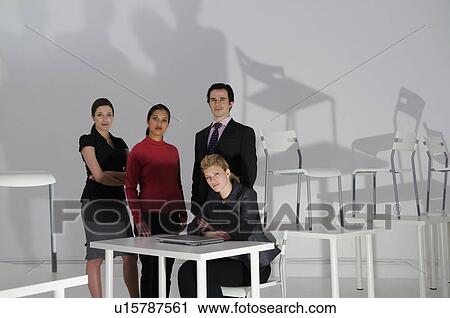 Stock Image - Late night at the office. Fotosearch