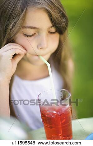 Little girl in the backyard View Large Photo Image Stock Photo - Little girl in the backyard. Fotosearch