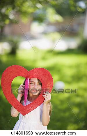 Little girl in the backyard View Large Photo Image Stock Photo - Little girl in the backyard. Fotosearch