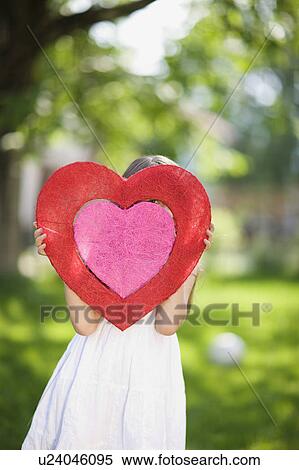 Little girl in the backyard View Large Photo Image Stock Photography - Little girl in the backyard. Fotosearch