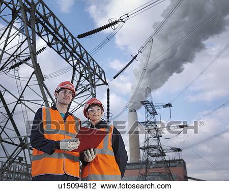 Male & Female Workers At Power Station View Large Photo Image Stock Image - Male & Female Workers At Power Station. Fotosearch