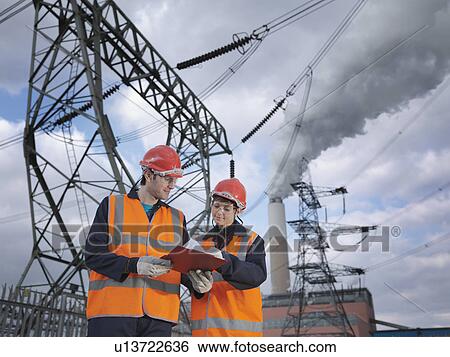 Male & Female Workers At Power Station View Large Photo Image Stock Photograph - Male & Female Workers At Power Station. Fotosearch