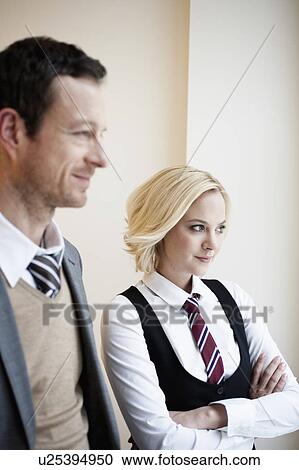 Man and woman watching View Large Photo Image Stock Image - Man and woman watching. Fotosearch
