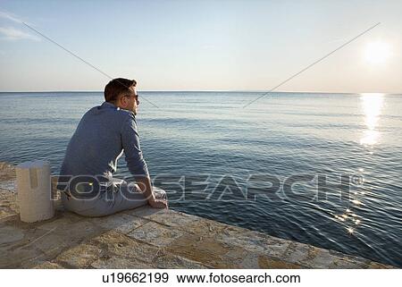 Man at sea View Large Photo Image Stock Photo - Man at sea. Fotosearch