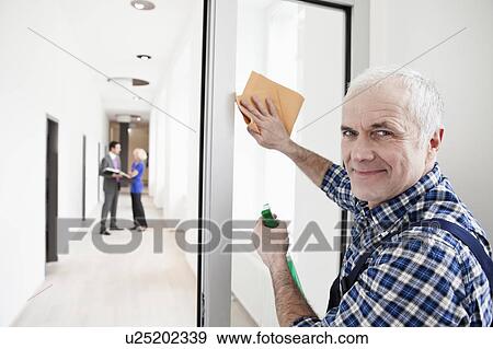 Man cleaning window View Large Photo Image Stock Photo - Man cleaning window. Fotosearch